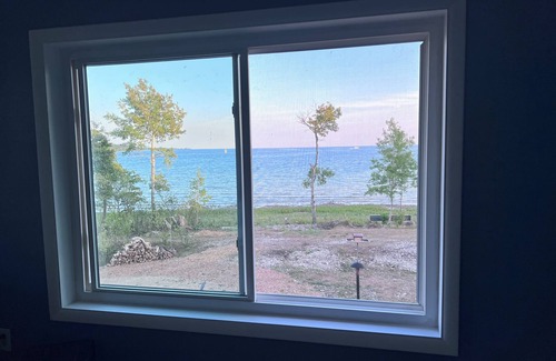 Washington Island House | Relax lakeside, watch the ferry boats go by as you listen to the waves roll in.