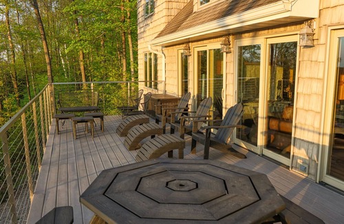 Egg Harbor House | Relax or do nothing at all high on the bluff with water views second to none.