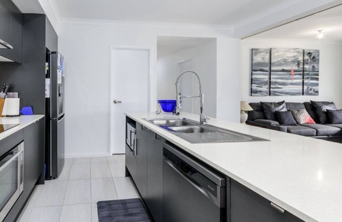 Bongaree House | Relax Poolside by the Canal