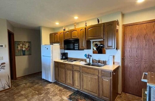 Kewadin Condo | Relax & Unwind | Overlooks Hole 8 + Torch Lake