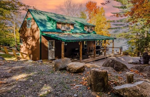 East Corinth House | Relax & unwind enjoying stunning views of the lake. Comes with a private dock.