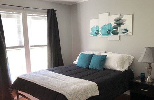 Maryville House | Relax while listening to a Natural Waterfall from your Private Park!