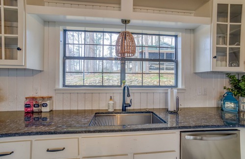 Killen House | Relax with the family at this beautiful lakefront cabin located on Wilson Lake.