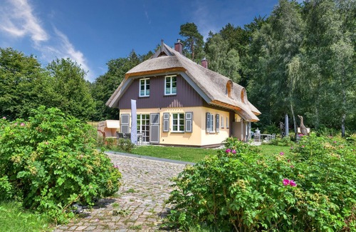 Putbus House | Relaxation by the water: Holiday home Herrlichkeit 1 in the Klein Stresow vacation village