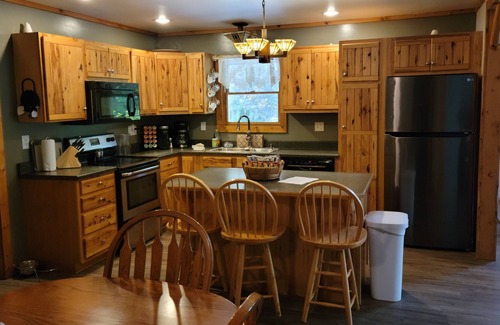 Paris House | Relaxation or Adventure- both await you at Riverside Lodge on the Muskegon River