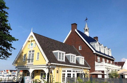 Municipality of Huizen Hotel | Relaxing 2-Unit Stay by Gooimeer | Walk Naarderbos & Explore Nightlife