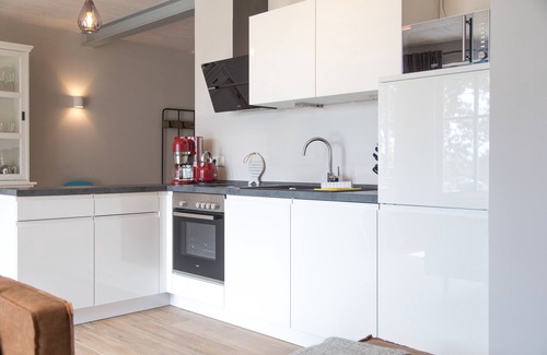 Dornum Apartment | "Relaxing family vacation at Gulfhof Dreybült: nature, comfort and fun!"