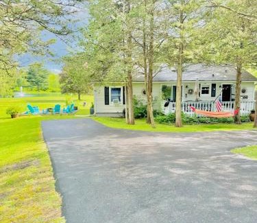 Athens House | Relaxing Pondfront Escape with Hot Tub & Outdoor Fire Deck