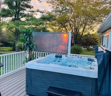 Athens House | Relaxing Pondfront Escape with Hot Tub & Outdoor Fire Deck