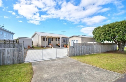 Omaha House | Relaxing sun drenched beach house with sea views ideally suited to families