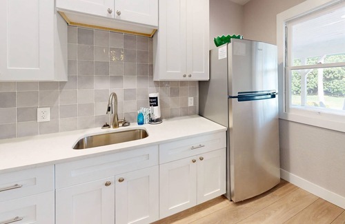 Madeira Beach Condo | Remodeled Florida Beach Cottage with Private Patio Area. Relax at the Pool. Walk Over to the Beach.