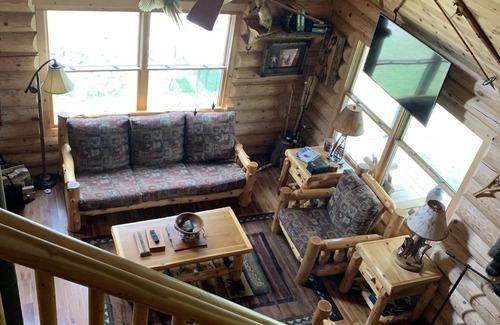 Champion Cabin | Remote log lodge in the Huron Mountain foothills.