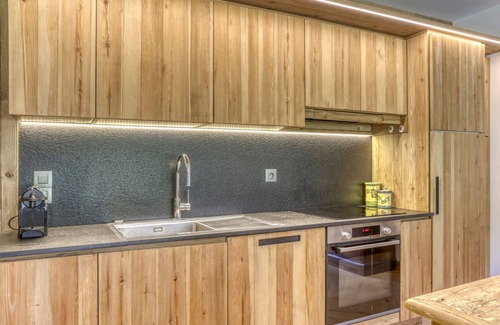Le Planellet Apartment | Renovated 2-Bedroom Apartment in Megève Centre with Balcony, Fireplace, and Covered Parking