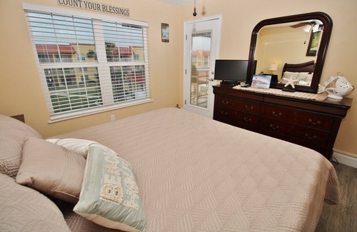 Point East Condo | Renovated Beach Condo with Views of Non-Driving Beach and Pool!