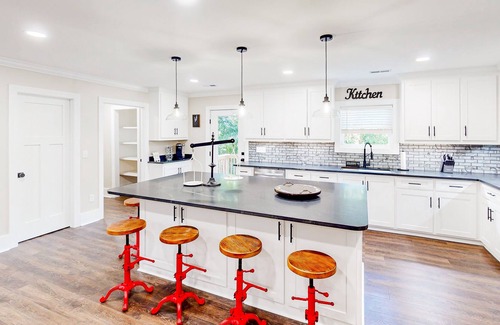 Lexington House | Renovated home with covered deck, fireplace, & all-new interior