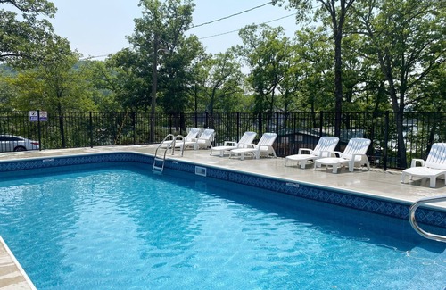 Camdenton Cabin | Renovated lakeside cabin with pool & resort amenities!
