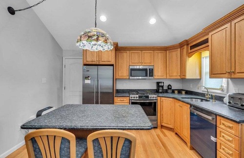 Point Pleasant Beach Condo | Renovated, open concept 1BR unit w/porch room, futon in LR, huge basement, 2 badges to beach!