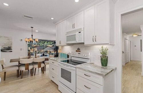 Moorings Villa | Renovated Villa less than 1 mile to beach with Pool & Spa! Dog Friendly!