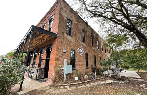 Chester Apartment | Rent the 10,000 sq. ft historic 1887 Beard and Lady Inn surrounded by the Ozarks