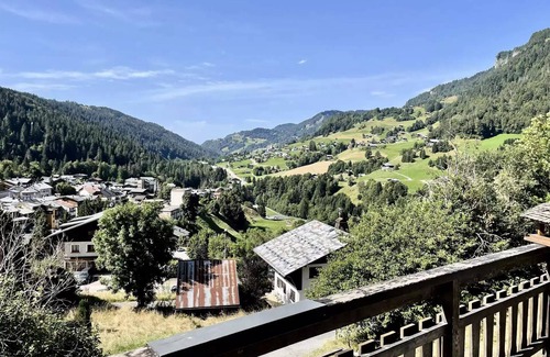 Flumet Ski Chalet | Residence Chez Simone - Chalet Simone overlooking a typical village in Val d'Arly