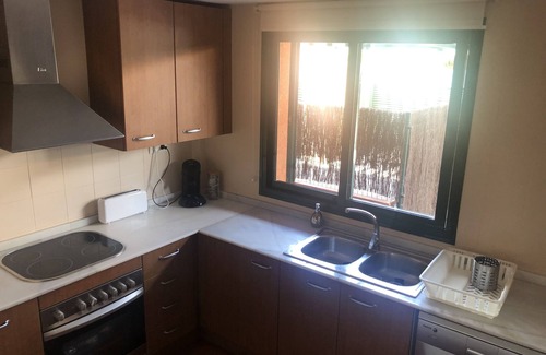 L Almadrava Apartment | Residential apartment on ground floor with garden and direct access to the swimming pool.