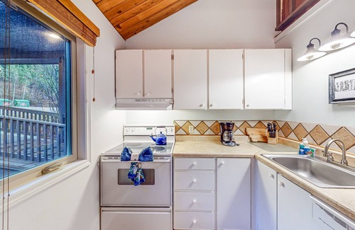 Whitefish Condo | Resort condo with in/outdoor pools, beach, fishing pond, dock, sauna, & tennis