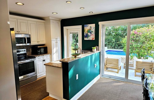 Old Northwood House | Resort Style Pool Home, 1 mi. to Palm Beach Island