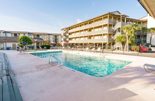 Tybee Island Apartment | Resort views - Huge Balcony - Steps to the beach!