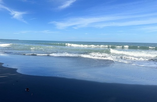 Cahuita House | Rest , Restore, and Relax steps away from the beautiful black sands beach.