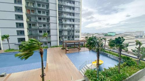Jakarta Apartment | Restful and Modern 3BR at Daan Mogot City Apartment By Travelio