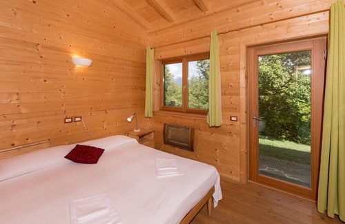 Ponte d'Assi Cabin | Retino Wood House - wooden cottage with veranda - green energy