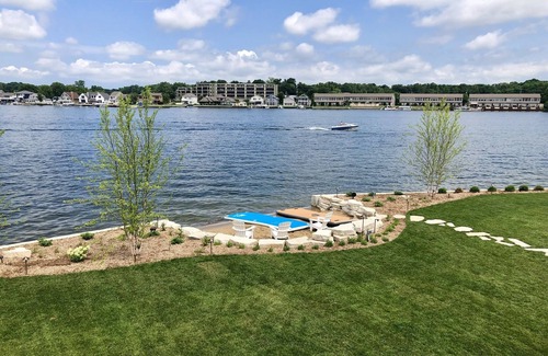La Porte House | Retreat on the point of Pine Lake with your own pool/ hot tub.
