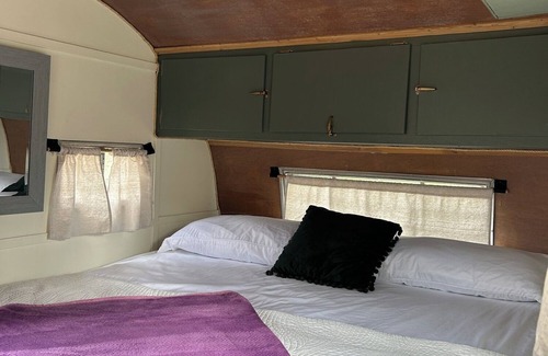 Lava Hot Springs House | Retro Camper king size bed