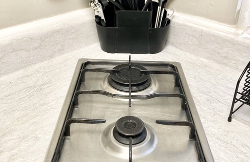 Arvada Apartment | Retro Chic Micro-studio in Heart of Downtown Olde Town Arvada | 85 Walk Score