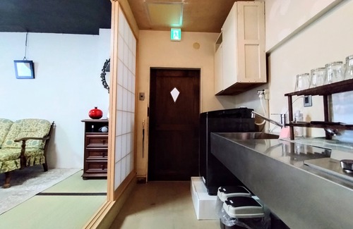 Yokosuka House | Retro Romantic Room! Private rooftop room with a view of Tokyo Bay beyond the Uraga Dock.