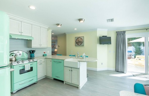Holmes Beach Cottage | Retro Style Home with Large Pool Close to Downtown Holmes Beach and Walk to Beach!