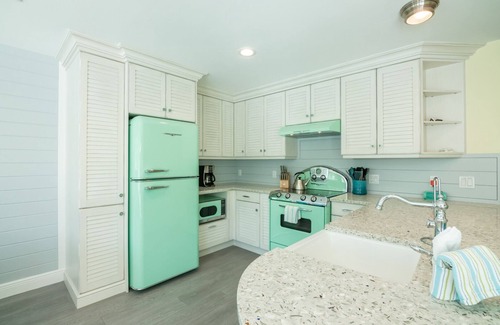Holmes Beach Cottage | Retro Style Home with Large Pool Close to Downtown Holmes Beach and Walk to Beach!
