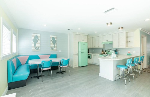 Holmes Beach Cottage | Retro Style Home with Large Pool Close to Downtown Holmes Beach and Walk to Beach!