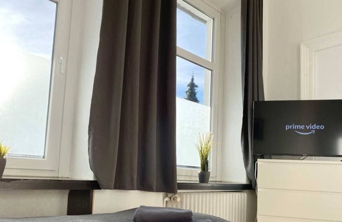 Rheine Apartment | Rh01 - Geräumige Ferienwohnung mit Terrasse und Garten in Rheine, 110 qm, 1 Wohnzimmer, 4 Schlafzimmer, Max. 8 Personen