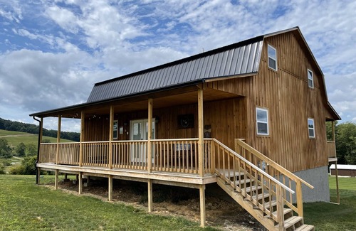 Logan Cabin | Ridge top cabin with hot tub and movie theater