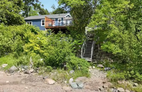 Clifton Royal Cottage | River Front Getaway with private beach and close to all amenities.