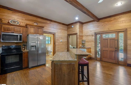 Cleveland Cabin | Riverfront 3BR Cabin minutes to Table Rock. Fire pit, hot tub, and game room.