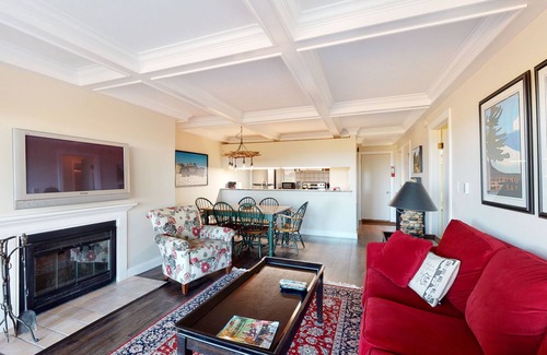 Glen Arbor Condo | Riverfront condo with beach access to lake, fireplace, furnished deck & cable