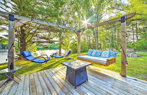 Cheboygan Cottage | Riverfront Home w/Dock ~ 6 Mi to Cheboygan!