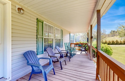 Sparta House | Riverfront home with a large yard, fireplace, deck, & washer/dryer