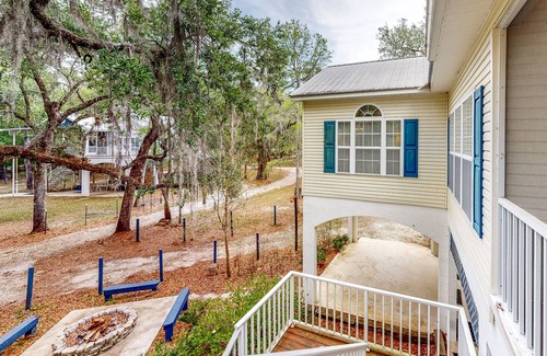 Bell House | Riverfront home with screened porch, shared dock