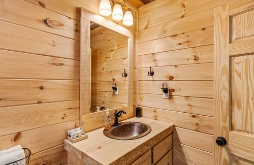 Cherry Log House | Riverfront oasis with hot tub, firepit, game room, & trail access - dog-friendly