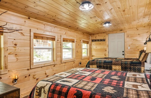 Cherry Log House | Riverfront oasis with hot tub, firepit, game room, & trail access - dog-friendly