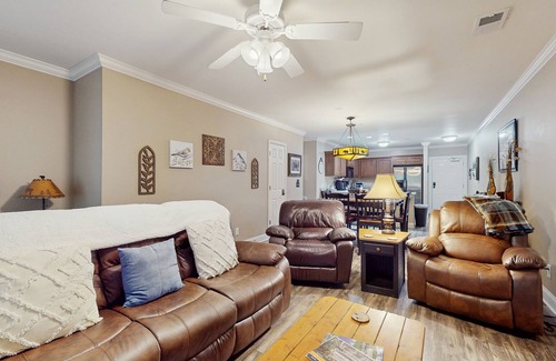 Helen Condo | Riverfront oasis with dual suites, 3 fireplaces, central AC, & walkable locale