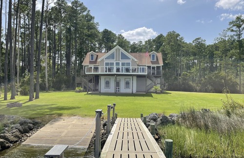 Hobucken House | Riverfront property with dock and ramp. Dolphins, fish, boat, swim & more